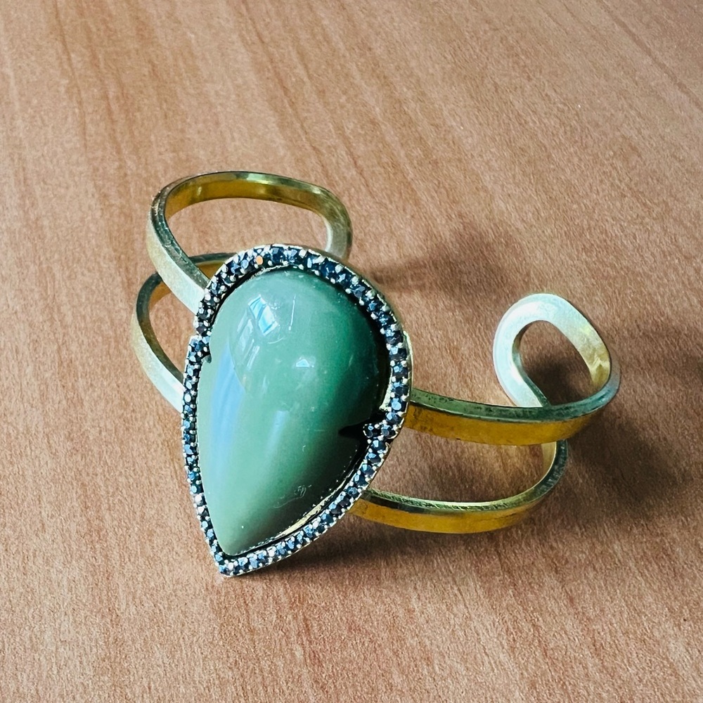 Olive green and yellow gold tone cuff bracelet